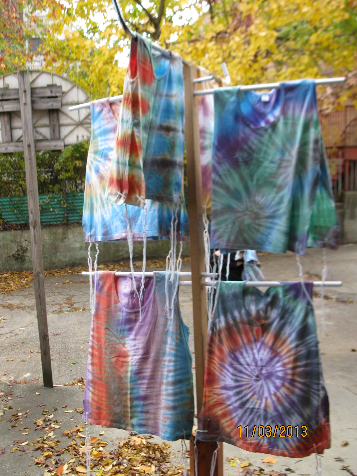 Rows of colorful tzitzit drying