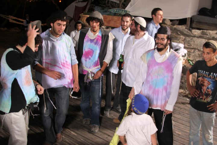 Child in colorful tzitzit
